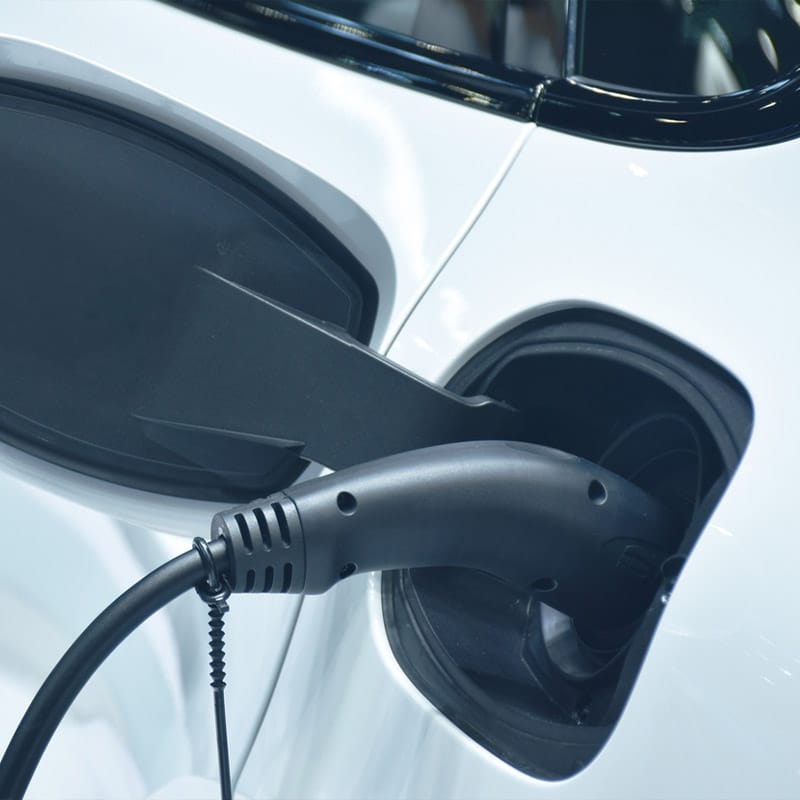 a car parked in front of a mirror