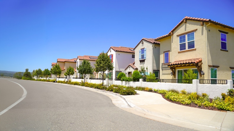 a house on the side of a road